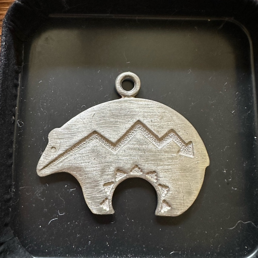 Huge Native American style pendant! I think it’s pewter.